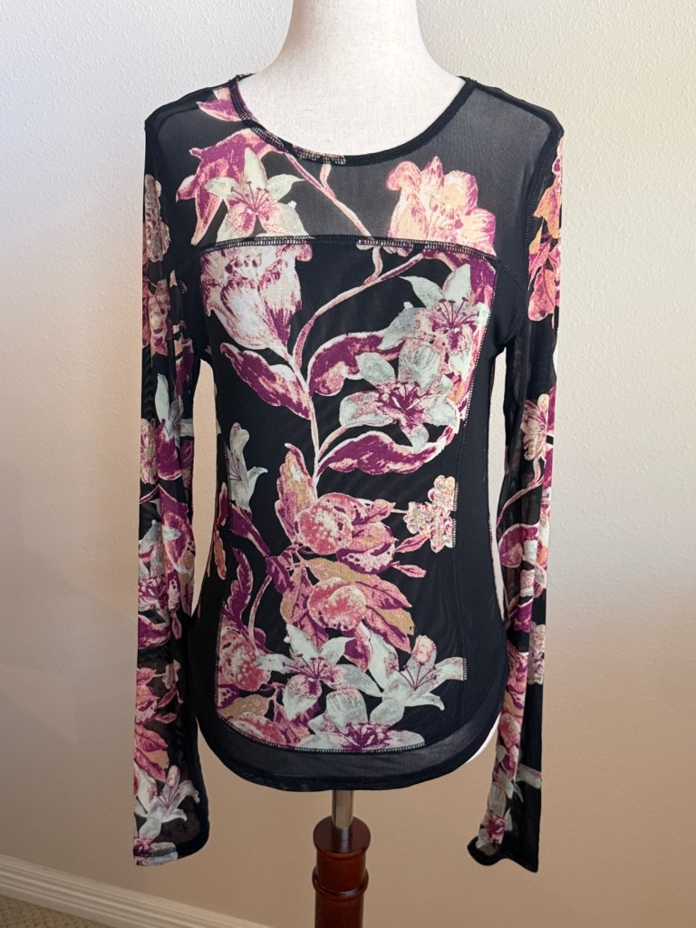 Free People Betty’s Garden black and floral mesh long sleeve top.